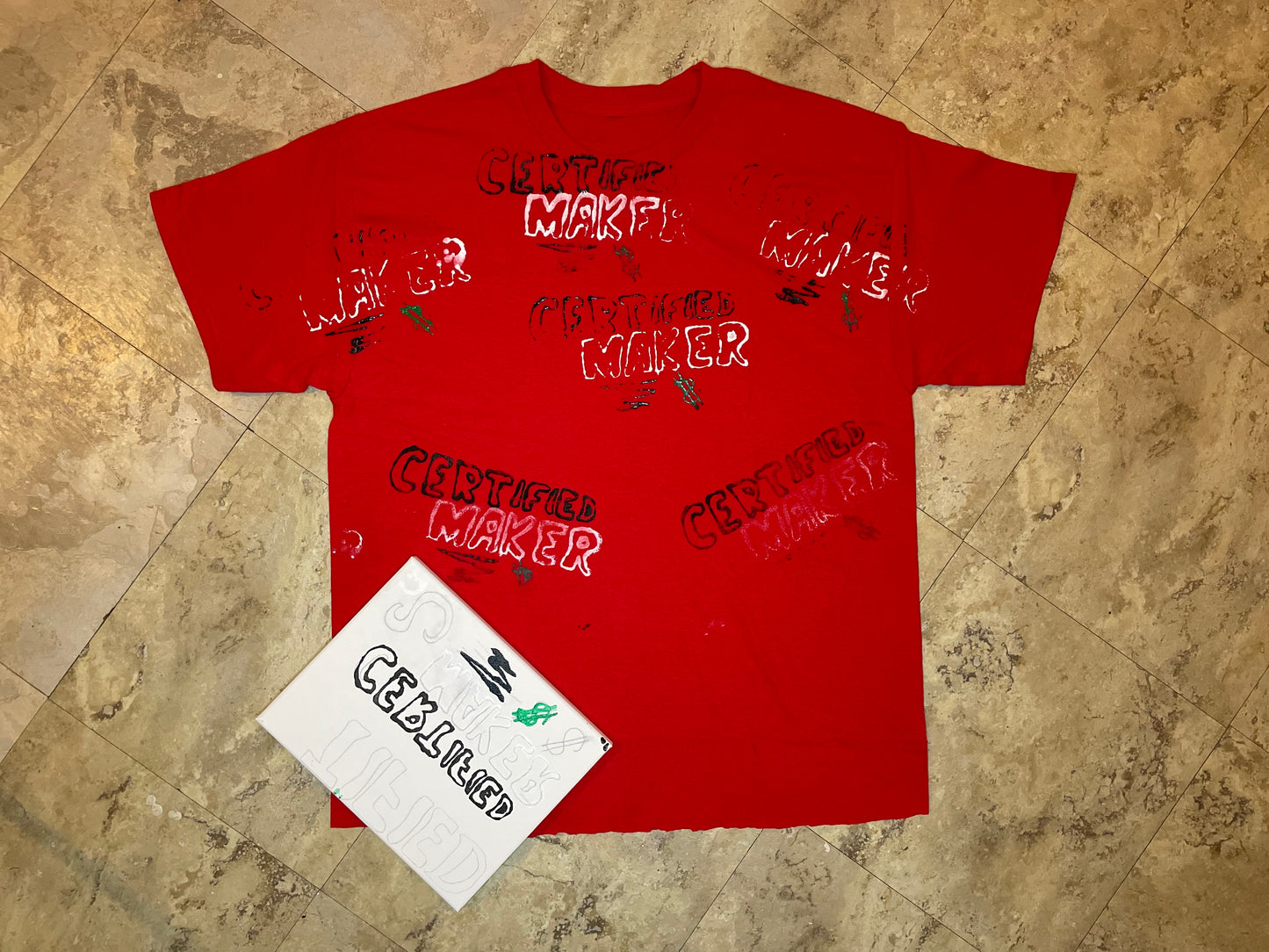 graphic “CERTIFIED $ MAKER” oversized tee .